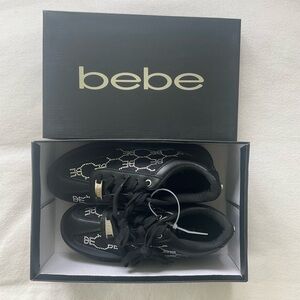 bebe Rhinestone Black Sneakers.
Size 7.